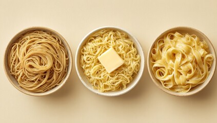 Three bowls of different types of noodles, overhead shot