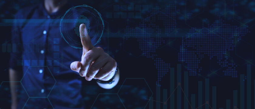 Person touching virtual interface with circular digital graphic overlay, blue tones, and world map background. Cyber security concept