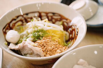 The Dark Broth: Close-up on Traditional Thai Boat Noodle Soup