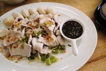Restaurant Menu Display: Appetizing Platter of Thai Boiled Meat Dip