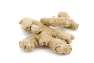 Raw ginger root set on a sharp white background.