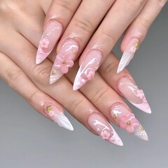 Elegant floral nail art design trend for stylish women, showcasing stiletto shape and 3D pink flower embellishments © Fluffy Nature