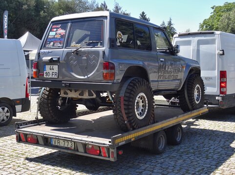 Nissan Patrol off-road SUV on flatbed trailer