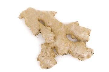 Whole ginger arranged on a neutral white surface.