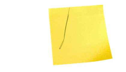 Isolated bright yellow sticky note with angled crease on black background
