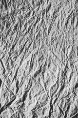 Photographic texture featuring a crumpled white sheet 