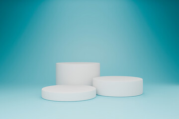 The white cylindrical objects are resting on the blue background