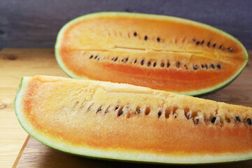 Orange watermelon, an ancient fruit cultivated for thousands of years believed to be the color of...