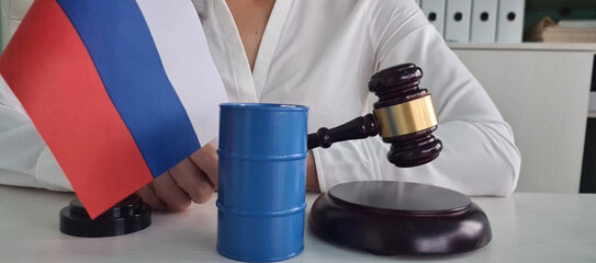 Russian Flag and Oil Barrel With Gavel in Courtroom