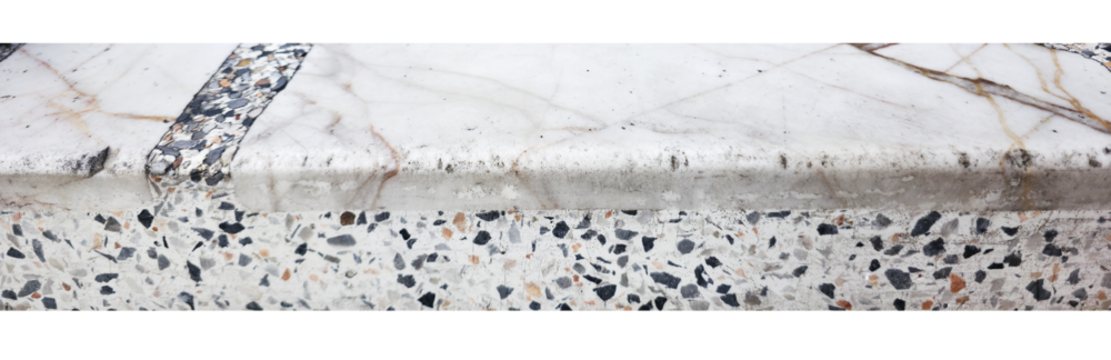Dirty terrazzo and marble bench edge texture