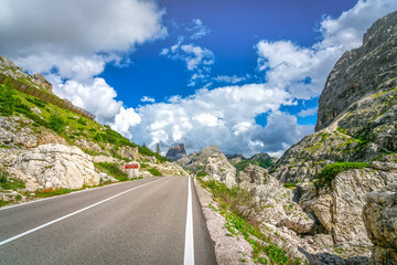 Scenic Mountain Road and Cliffs at Valparola Pass, Dolomites, Italy