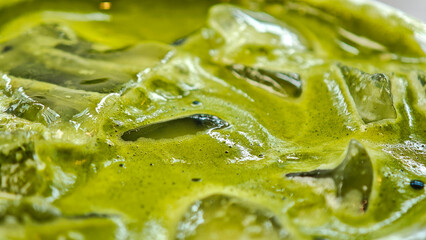Close up Matcha, green ice tea in glass on table