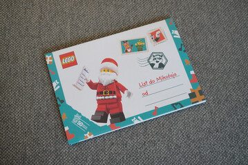 Obraz premium LEGO Santa Claus Letter to Mikolaj on a Gray Background