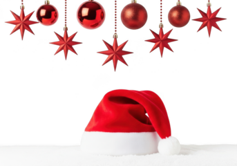 Red santa hat and festive christmas ornaments, including baubles and stars, on a snowy surface, isolated on transparent background