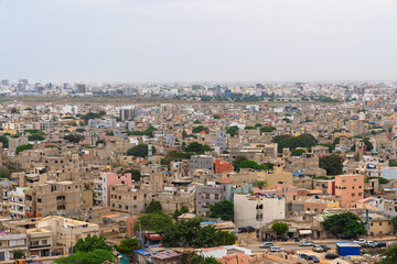 Obraz premium Dakar, Senegal. High-angle view of the sprawling urban landscape and residential buildings under an overcast sky