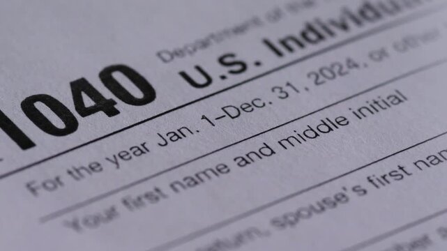 Close-up of IRS 1040 Tax Form, Personal Income Tax Payment Concept, Annual Income Reporting