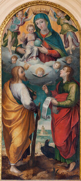 MAIORI, ITALY - OCTOBER 2, 2025: The painting of Madonna with the apostles St. John and Jude Thaddeus in the Cathedral of St. Matthew by unknown artist. 