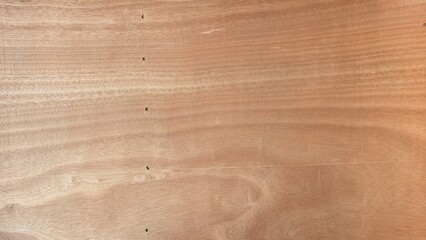 Light brown plywood veneer texture. Features a clear, smooth natural wood grain pattern and small...