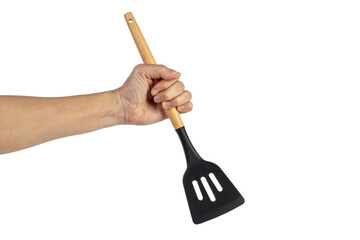 Hand holding kitchen utensils on transparent background