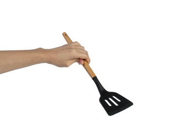 Hand holding kitchen utensils on transparent background