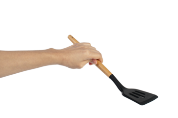 Hand holding kitchen utensils on transparent background