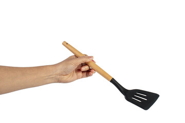Hand holding kitchen utensils on transparent background