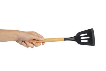 Hand holding kitchen utensils on transparent background