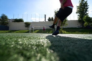 Action shot of player scoring penalty kick