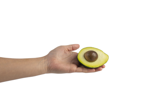 whole and half avocado and hand isolated on transparent background close-up. - Powered by Adobe