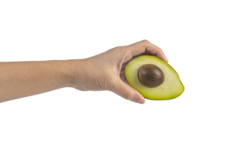whole and half avocado and hand isolated on transparent background close-up.