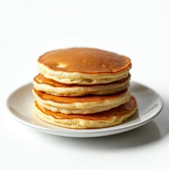 Stack of fluffy golden brown pancakes sits on white plate. Freshly cooked breakfast pastries isolated on clean white background. Sweet, delicious homemade meal ready to eat for morning treat. Perfect