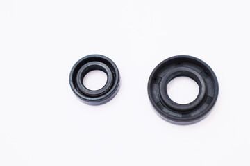 New rubber oil seals for a brush cutter or small two-stroke engine.