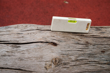 Outdoor. small spirit level on wood
