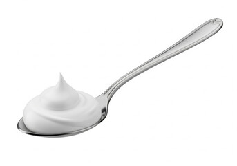 Spoonful of smooth white whipped cream, A delicious topping for desserts isolated on white