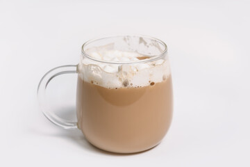 Glass mug with hot cocoa and marshmallows on a white background