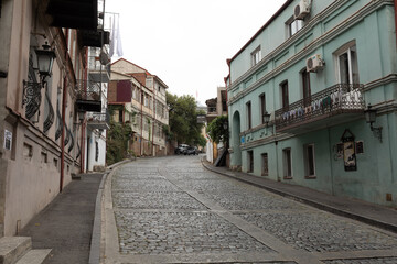 Obraz premium Cobblestone Street With Colorful Old Town Architecture In Tbilisi Georgia