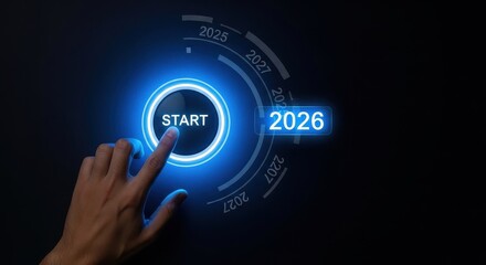 Starting 2026 hand pressing a futuristic start button for the new year