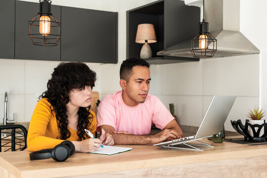 Focused friends sharing learning moment in urban lifestyle