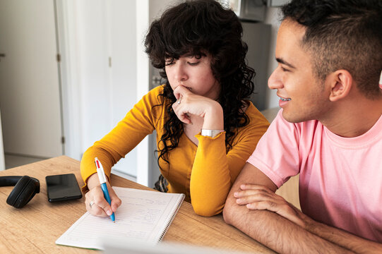 Engaged friends deepening communication during shared study time