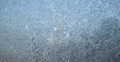 frost pattern on frozen window freezing icy glass texture abstract christmas background