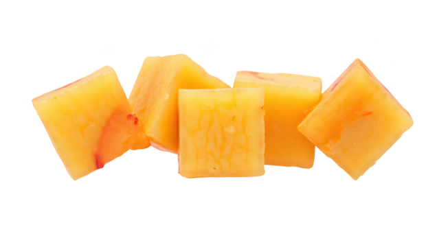 Fresh cheese cubes arranged in playful manner, showcasing vibrant yellow orange color and smooth texture, perfect for snacking or cooking