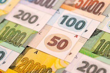 Congolese franc money bills in big amount on table close up. Rich life concept in Democratic...