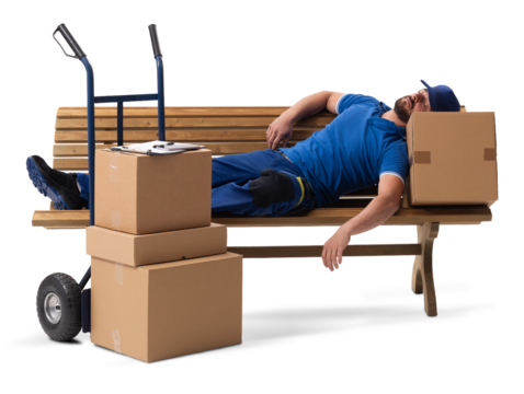 A delivery courier lying on a bench, sleeping with a hand cart of parcels.