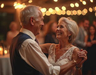 Elderly couple dance happily at elegant wedding party. Smiling bride and groom celebrate love. Joyful seniors enjoy music and lights at festive reception. Mature man and woman share moment.