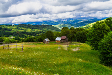 Beautiful rural landscape with hills, forests and fields. Maramures, Romania