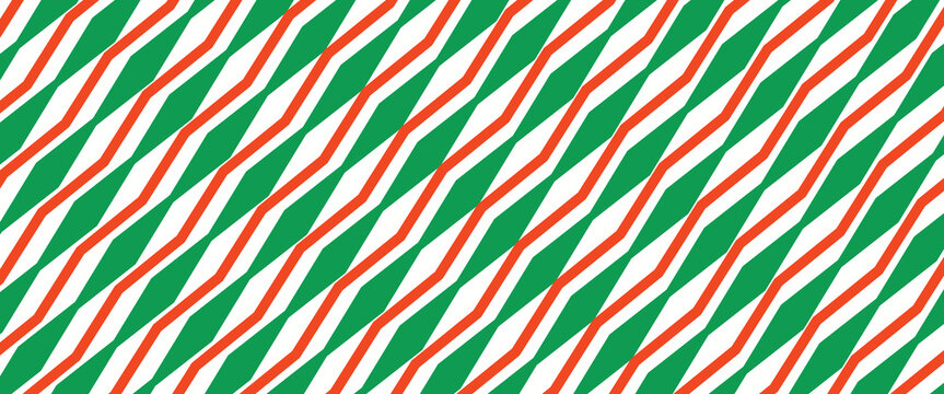 Christmas seamless pattern. Red and green diagonal stripes background. Candy cane repeating decoration wallpaper. Winter holiday lines backdrop. Xmas peppermint present wrapping print design. Vector