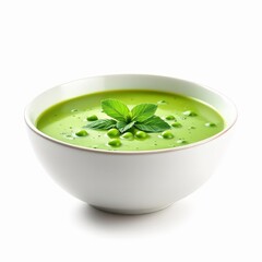 Vibrant green pea and mint soup served in a white bowl, isolated on white background