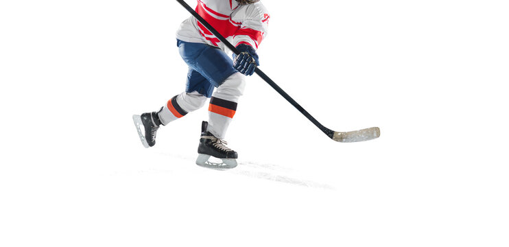 Ice hockey rink arena with professional player shooting the puck with hockey stick, isolated on free png background.