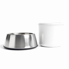 Stainless steel pet food bowl next to a white storage container for pet food, isolated on white background