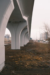 Modern Bridge Pillars and Urban Construction Site &ndash; Structural Perspective